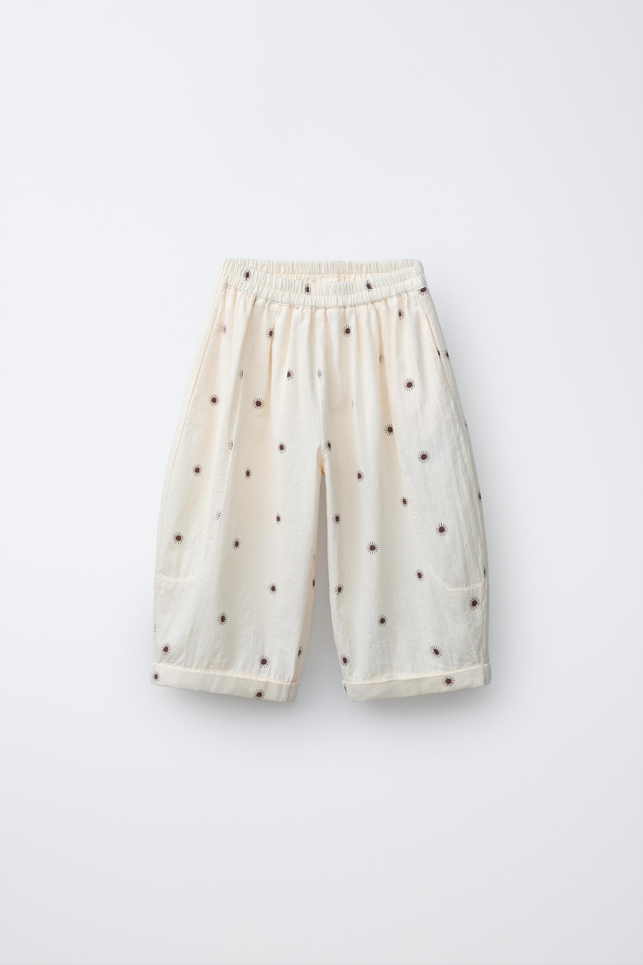 TEXTURED SUN PRINT BAGGY PANTS
